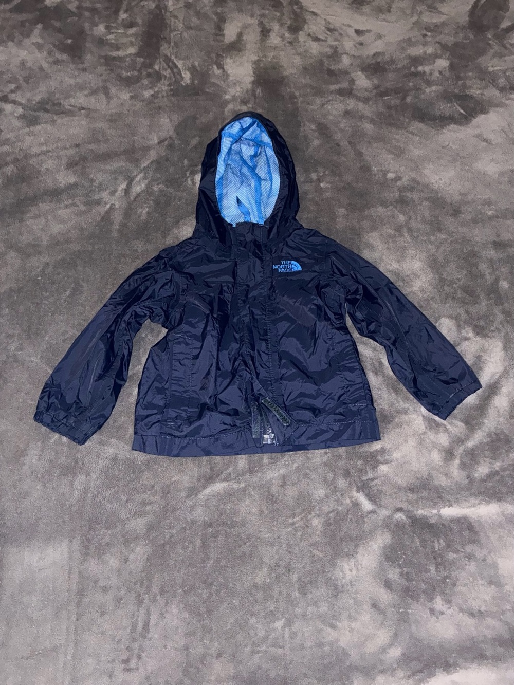 The North Face Kids Navy Hooded Raincoat with Light Blue Lining